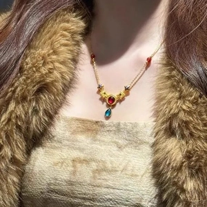 Vintage Ethnic Golden Alloy Necklace For Women With Round Red Resin Stone And Blue Water Drop Pendant Plus Star Charms