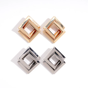 Modern geometric double rhombus interlocking earrings in gold and silver finish