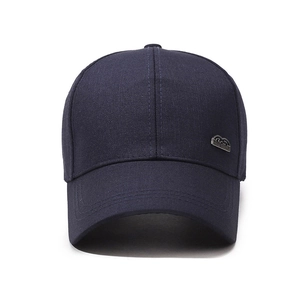 Classic navy cotton baseball cap for men with a sleek silver metal emblem on the front