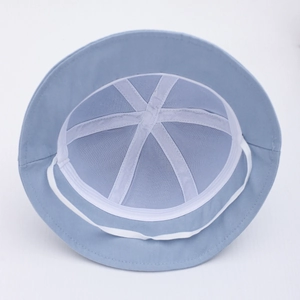 Close-up of baby sun hat interior showing breathable mesh lining and adjustable chin strap