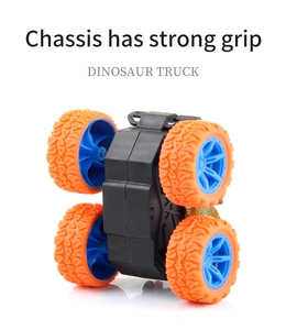 Detailed view of the dinosaur truck chassis with anti-slip tires and high-grip design