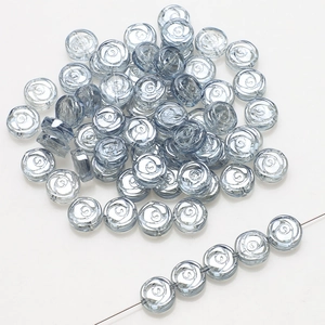 Detailed view of 10mm transparent blue rose-shaped glass beads for DIY jewelry making