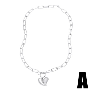Silver toggle necklace with dual heart pendant and shimmering cubic zirconia stones
