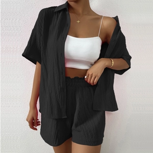 Women's summer black textured two-piece set featuring short sleeve shirt and high waist shorts