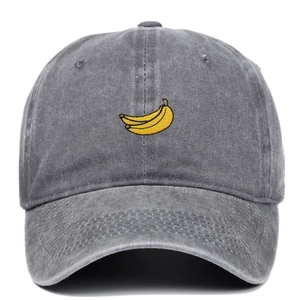 Vintage washed grey denim baseball cap featuring colorful yellow banana embroidery