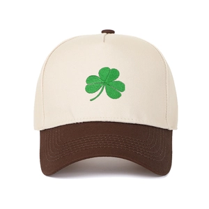 Two-tone trucker hat with green shamrock embroidery and curved brim baseball cap