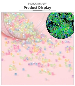 Detailed close-up of luminous macaron glass seed beads for DIY jewelry making sets