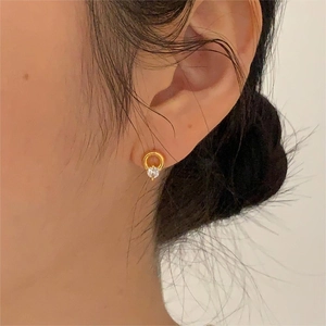 Minimalist 925 silver gold round stud earrings with sparkling cubic zirconia on model
