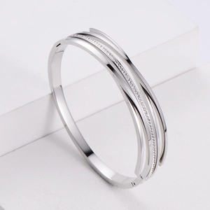 Modern silver multi-layer stainless steel bangle featuring sparkling zircon inlay accents
