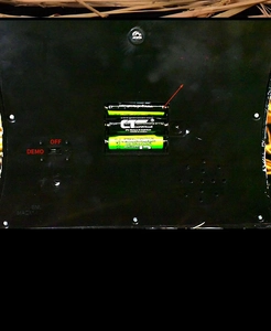 Detailed back view of Halloween tombstone showing the battery compartment and sound control