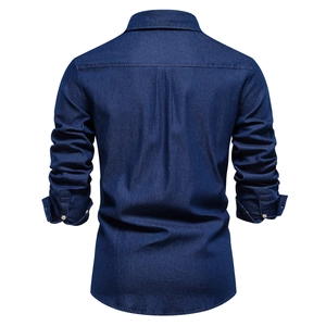 Back view of a long-sleeve dark blue denim shirt with a center pleat for a slim fit look