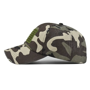 Close-up of camouflage baseball cap with distressed brim and American flag stripe detail