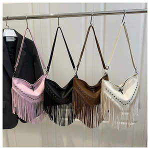 Detailed view of trendy fringe crossbody bags in four colors with rivet studs