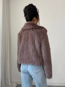 Elegant short mauve faux fur jacket with long sleeves showing back view and clean style