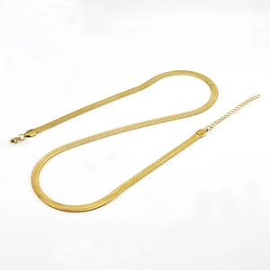 Detailed view of a gold-plated stainless steel snake chain with adjustable extender clasp