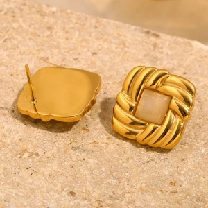 Square gold stud earrings with cat eye stone and twisted metal rope texture on stone base