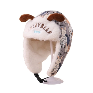 Chapeau trappeur enfant avec imprimés lapins et doublure en fausse fourrure chaude
