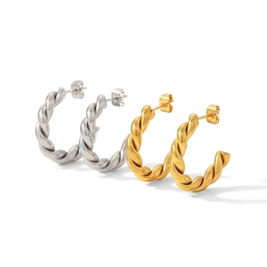 Twisted C-shape hoop earrings in 18K gold and silver finishes made of stainless steel