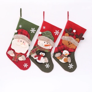 Three festive Christmas stockings featuring 3D Santa, Snowman, and Reindeer plush figures