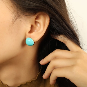 French vintage style sky blue round gold-plated titanium steel stud earrings on model