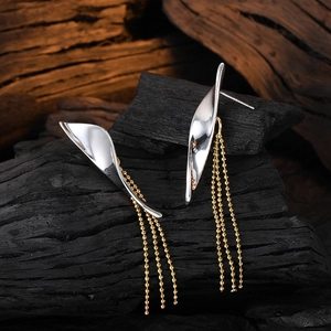 Elegant two-tone gold and silver willow leaf tassel chain earrings for women in polished metal