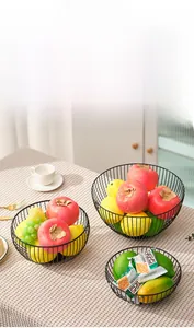 Three-piece black iron wire fruit basket set in varied sizes for home snack storage