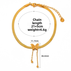 Detail of gold butterfly tassel anklet with flat snake chain showing dimensions and weight