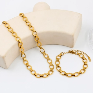 Golden titanium steel necklace and bracelet set with Greek Key engraved geometric links