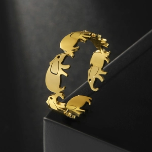 Polished gold elephant wrap ring in stainless steel with detailed animal carvings