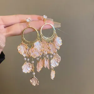Pink petal and pearl tassel hoop earrings with gold finish and sparkling zircon accents