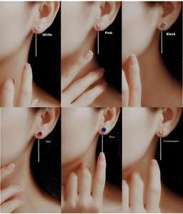 Detail view showing six colorful cubic zirconia silver tassel earrings on models