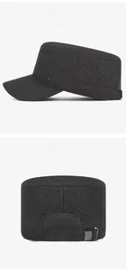 Detail view of winter flat top cap featuring sport metal logo and elastic back strap