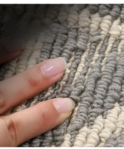 Macro detail of the double-layer fine weave texture on durable Nordic entrance floor mat