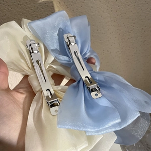 Elegant cream and light blue mesh bow hair clips with premium metal spring fasteners