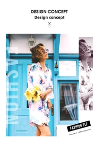 Detailed view of the blue floral print and collar on white cotton shirt dress