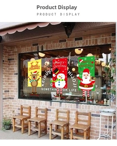 Detail of Merry Christmas banners with reindeer and snowman for holiday window decoration