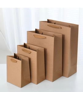 Brown kraft paper gift bags with woven handles shown in four different sizes