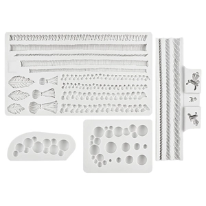Set aus weißen Silikon-Fondantformen mit Seil-, Feder-, Spitzen- und Blasenstruktur für Torten