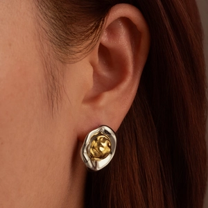 Irregular geometric oval earrings with silver and gold two-tone molten metal design