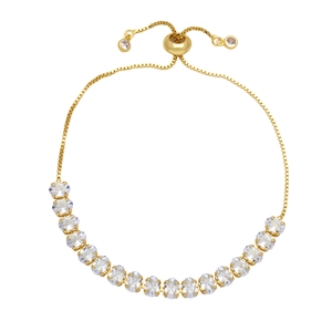 Detail view of gold bolo bracelet with oval-cut crystals and adjustable slider clasp