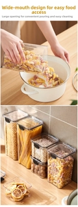 Detalle de tarros de cocina herméticos con tapas y diseño de boca ancha funcional