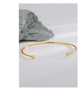 Detail view of gold-plated S925 silver adjustable open cuff with zircon stones