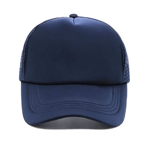 Detailed front view of navy blue trucker hat with breathable mesh and curved brim