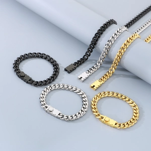 Hip hop style Cuban link chain in gold, silver, and black with gear pattern buckle
