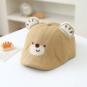 Close-up of baby bear beret hat with 3D ears and fine bear face embroidery details