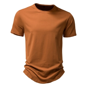 Detail view of cotton t-shirt with crew neck and stylish curved hem in caramel brown