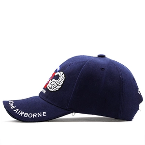 Detail of 82nd Airborne embroidery on dark blue cotton twill outdoor baseball cap
