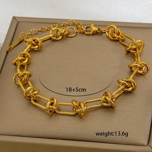 Detail of 18K gold plated titanium steel knot chain bracelet with 18+5cm size label
