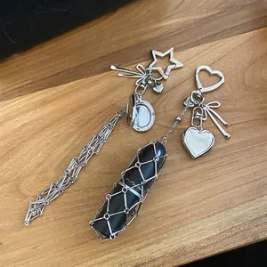 Silver heart pendant phone strap and lipstick holder keychain with metallic tassels