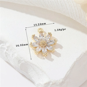 Detail view of 14K gold plated flower pendant with cubic zirconia and size measurements